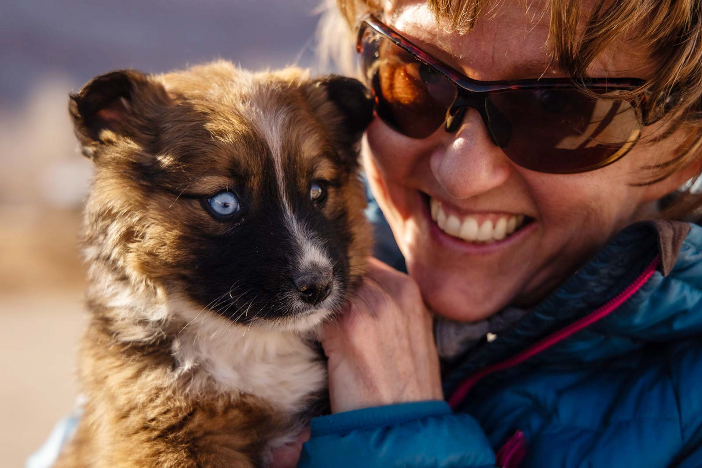 Volunteer with puppy